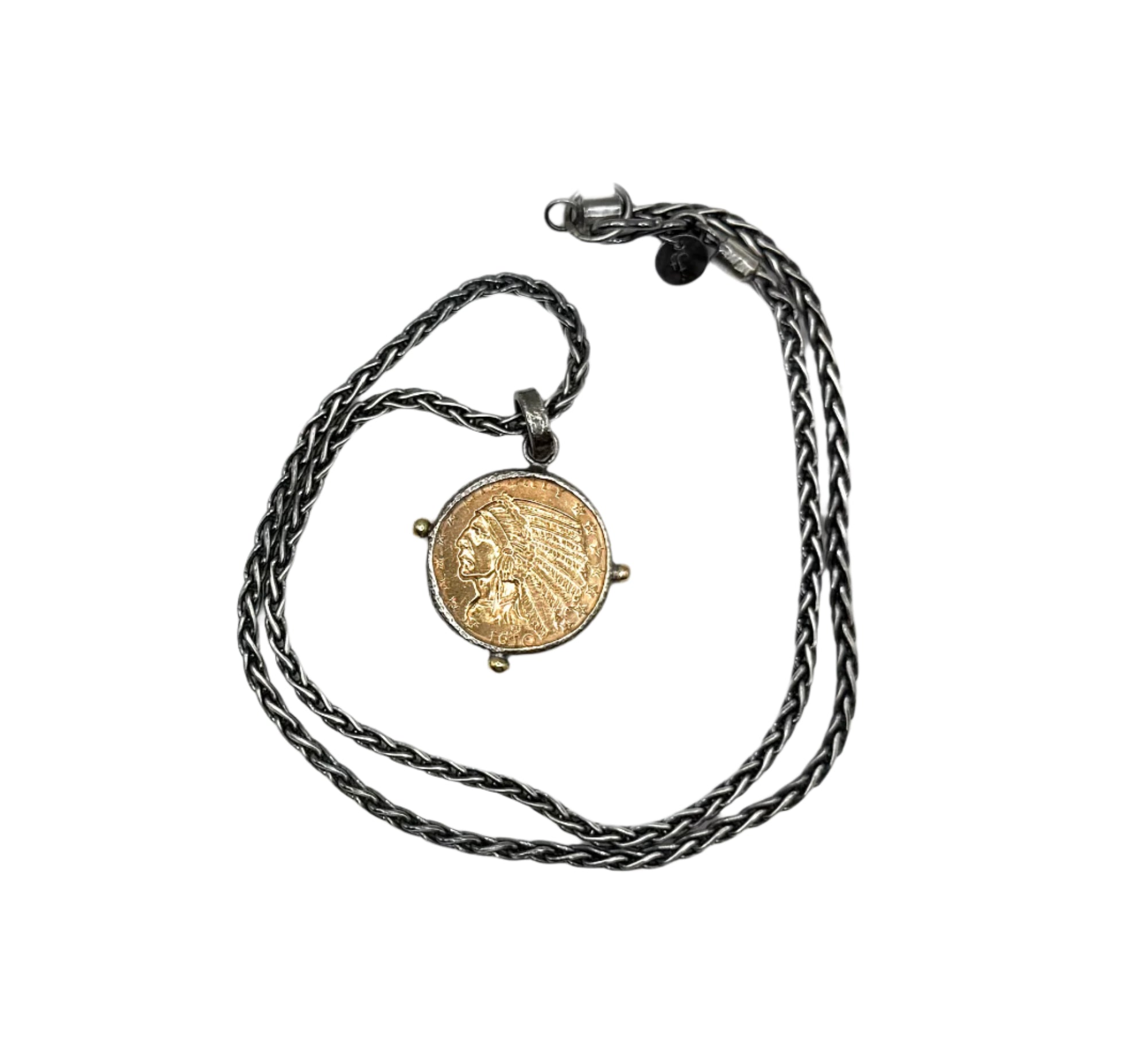 Necklace with a coin pendant on a white background