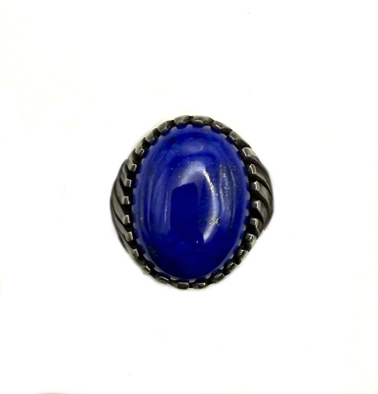 Blue oval stone ring with black band on a white background